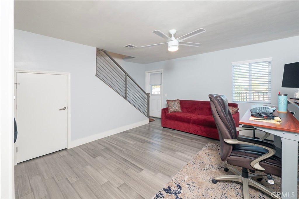 1310 Coronet Drive Riverside, CA 92506 - Photo 43 of 59 2nd floor bed w/ other staircase to 3rd floor. Door to balcony