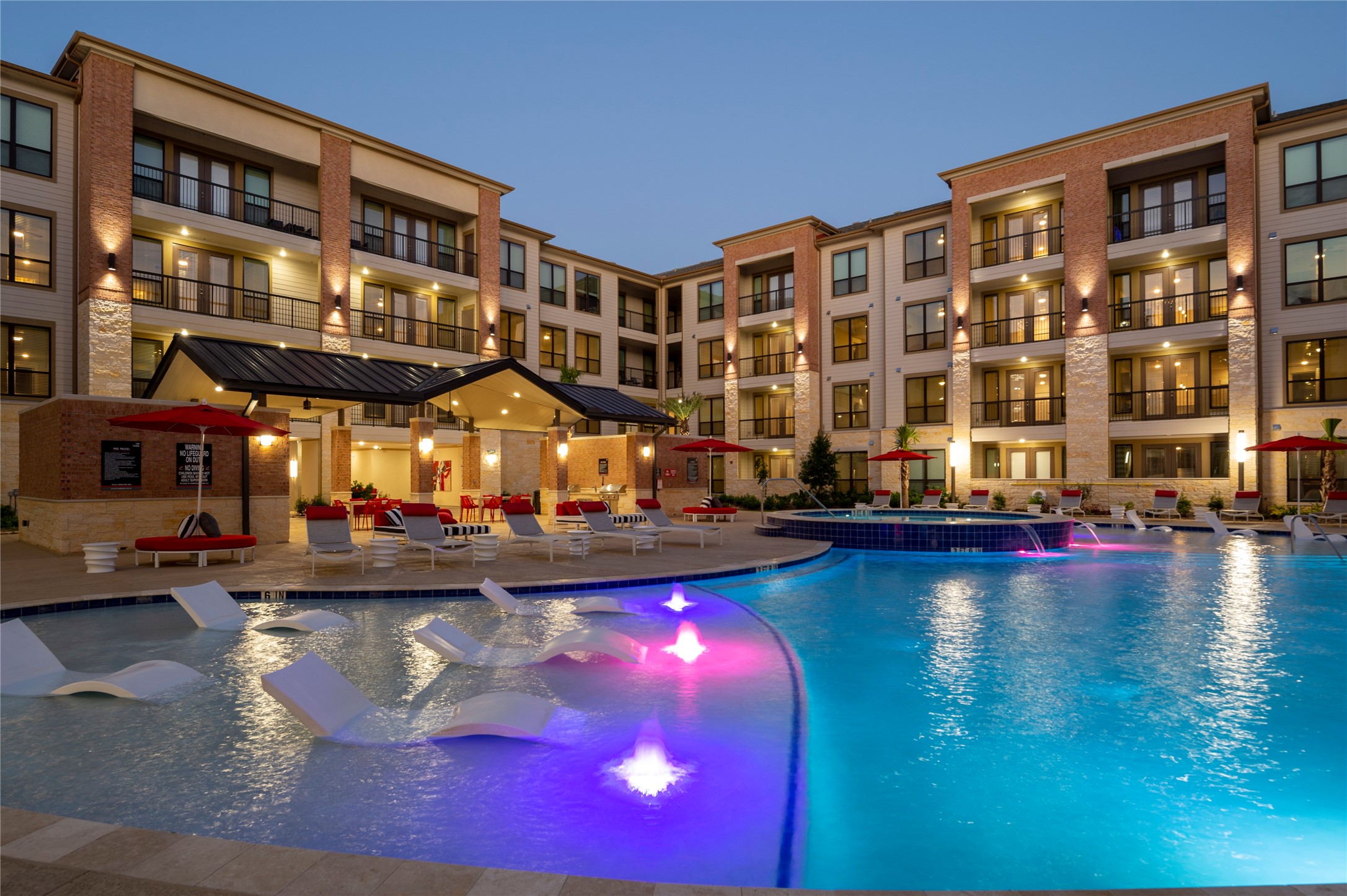 a view of swimming pool with outdoor seating