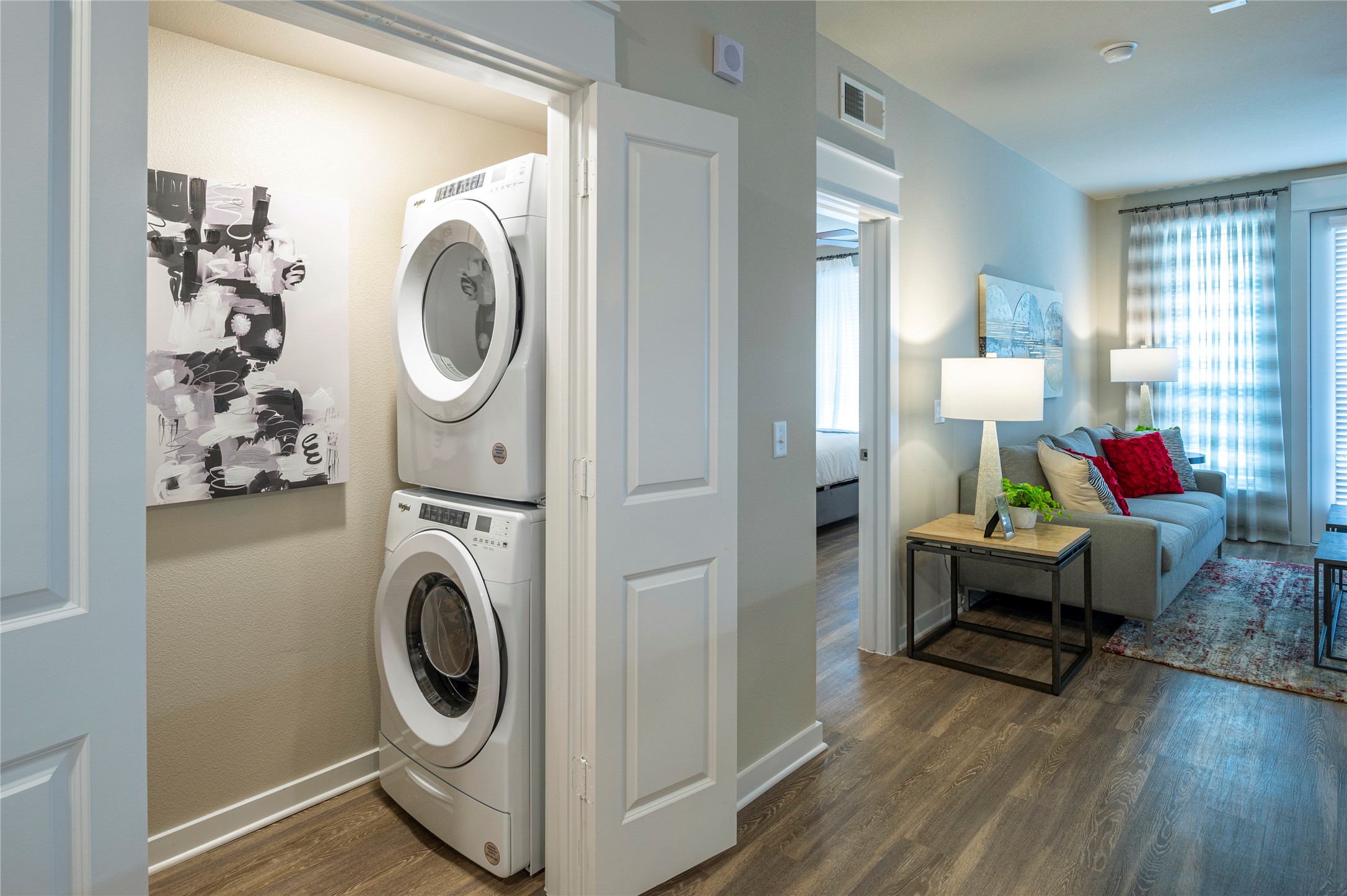 1616 Partnership Way, Unit 1145 Katy, TX 77449 - Photo 14 of 21 a living room with furniture and a wooden floor