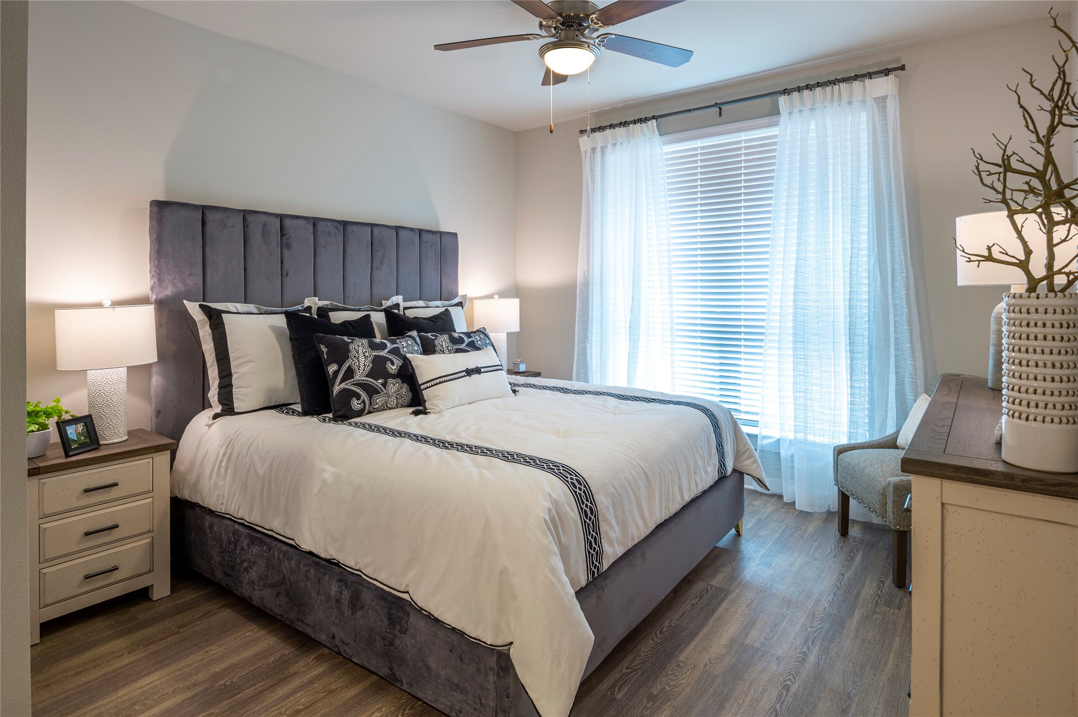 1616 Partnership Way, Unit 1145 Katy, TX 77449 - Photo 16 of 21 a bedroom with a bed and a window