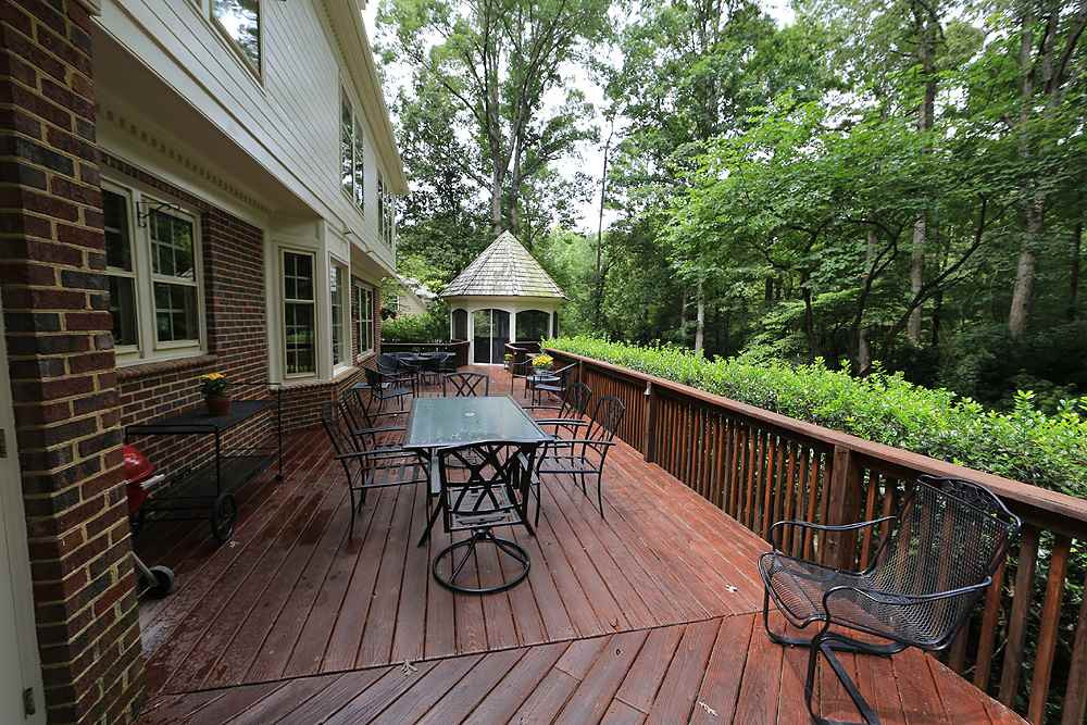 14408 Possum Track Road Raleigh, NC 27614 - Photo 22 of 25 Deck is over 50 feet long, great for entertaining. Deck