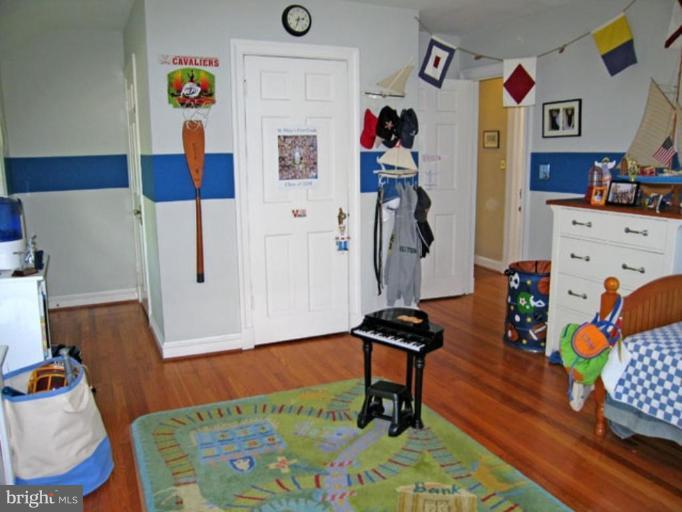 2809 Ridge Rd Drive Alexandria, VA 22302 - Photo 11 of 19 a bedroom with furniture and wooden floor