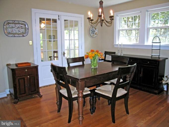 2809 Ridge Rd Drive Alexandria, VA 22302 - Photo 4 of 19 a view of a dining room with furniture window and wooden floor