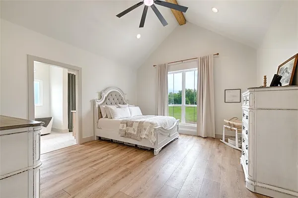 a bed room with a bed and a window