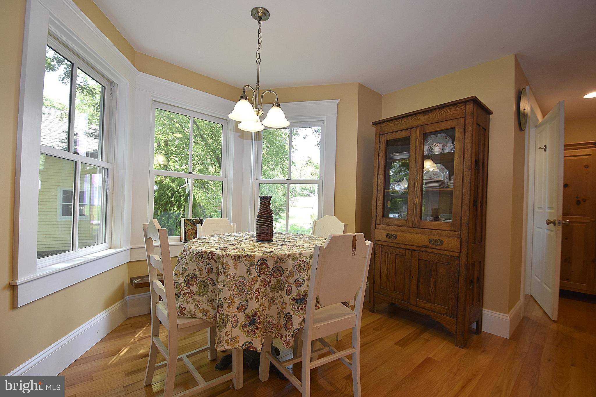 4832 Fairbank Road Tilghman, MD 21671 - Photo 11 of 34 Breakfast nook adjacent to kitchen, screen porch