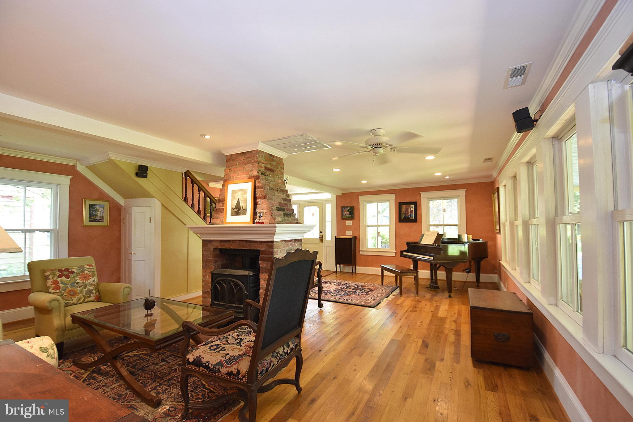 4832 Fairbank Road Tilghman, MD 21671 - Photo 5 of 34 Front entrance and living room with vintage floors