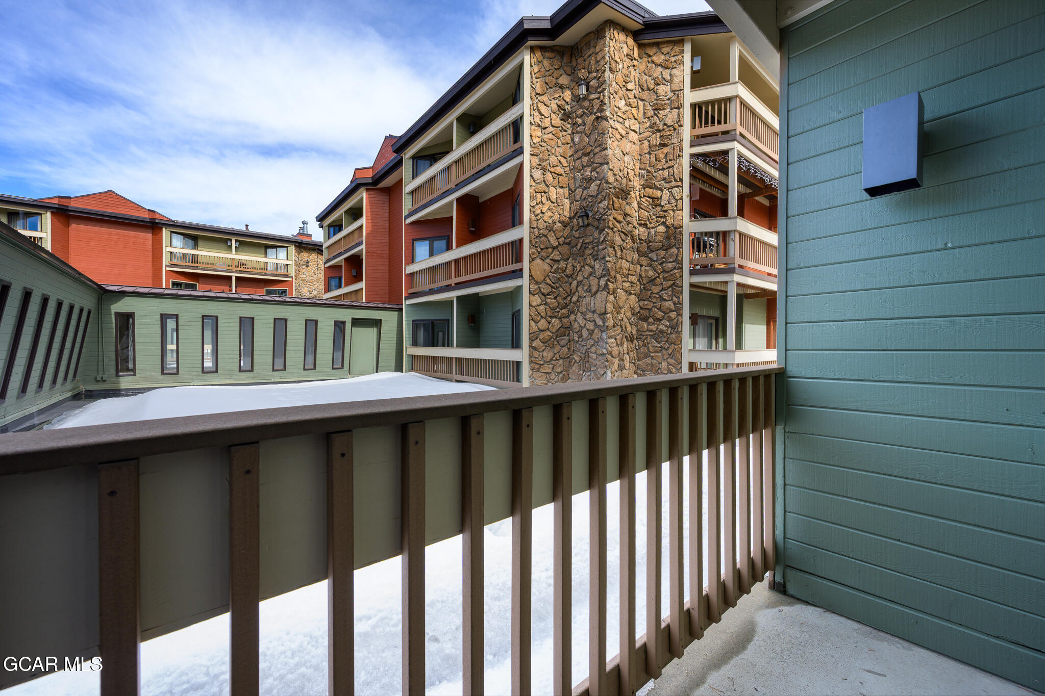 490 Kings Crossing Road, Unit 611 Winter Park, CO 80482 - Photo 23 of 39 a front view of a house with a balcony