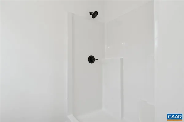 a close view of a shower in the bathroom