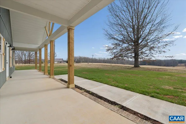 a view of a garden with an outdoor space