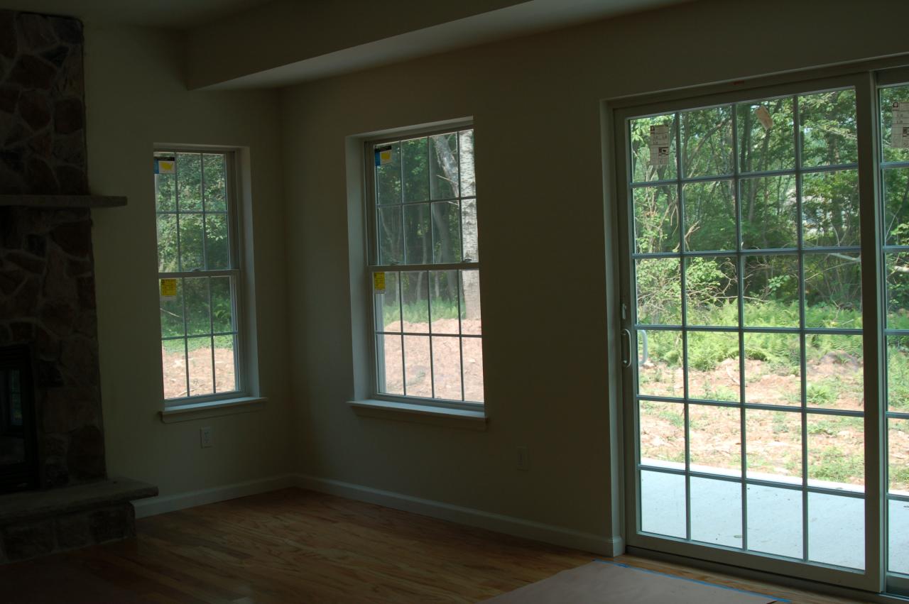 508 Ridge Road Pocono Lake, PA 18347 - Photo 8 of 8 a view of an empty room with wooden floor and windows