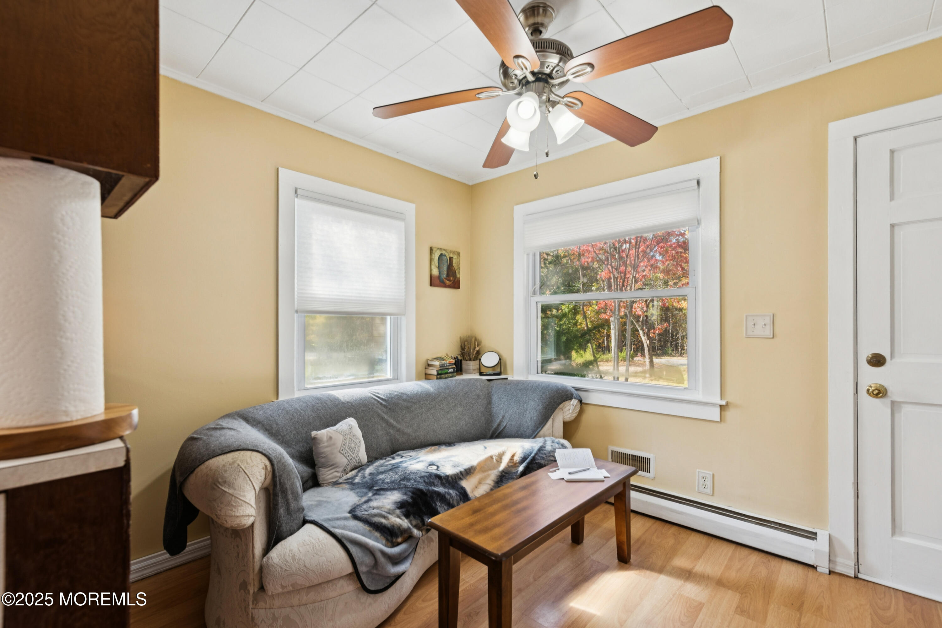 123 Georgia Road Freehold, NJ 07728 - Photo 11 of 25 a living room with furniture and a window