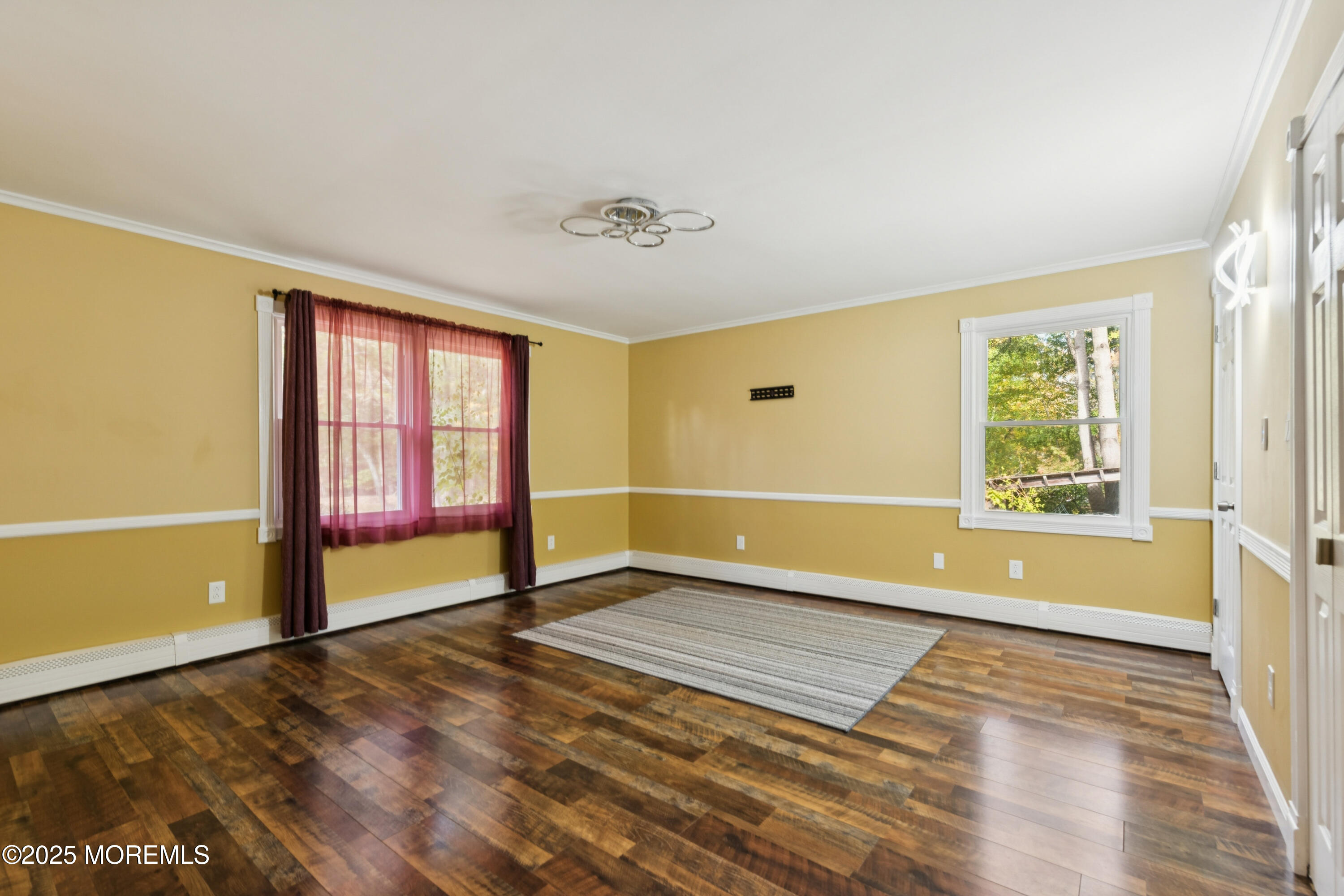 123 Georgia Road Freehold, NJ 07728 - Photo 12 of 25 a view of an empty room with a window