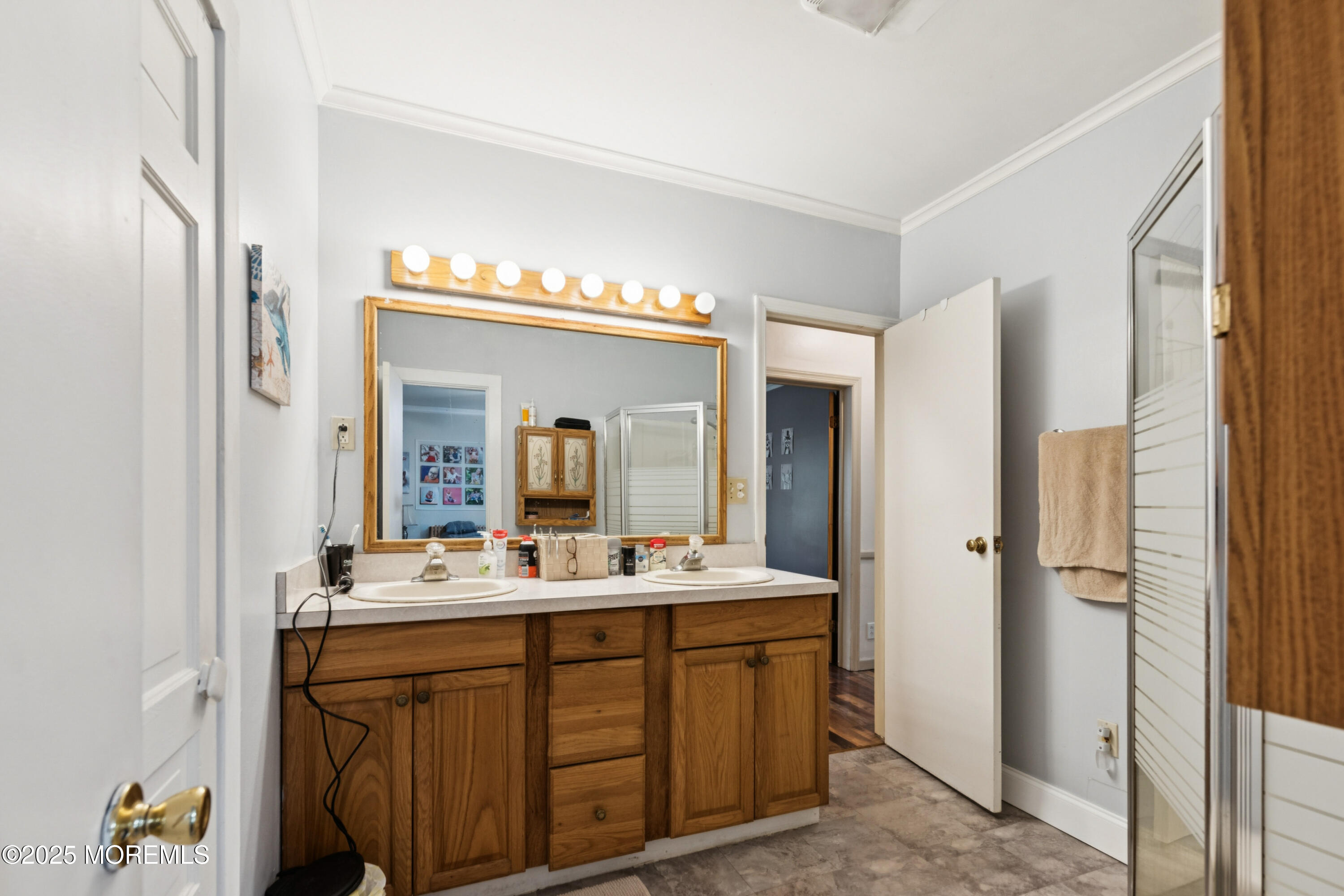 123 Georgia Road Freehold, NJ 07728 - Photo 20 of 25 a bathroom with a double vanity sink and a mirror
