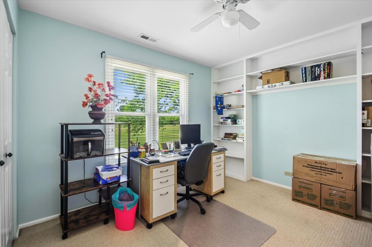 166 Hemingway Court, Unit 252 Vernon Hills, IL 60061 - Photo 14 of 18 a view of a workspace with furniture and a window