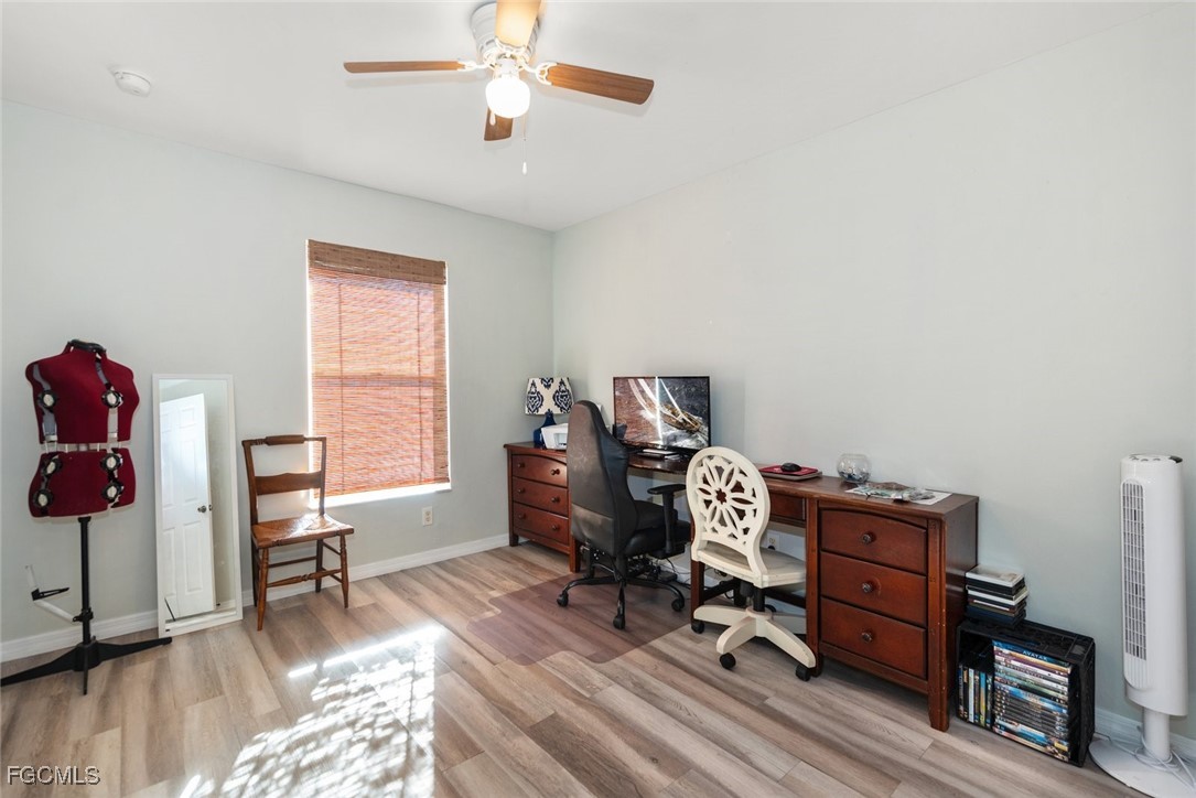 2005 Mc Arthur Avenue Alva, FL 33920 - Photo 23 of 32 a view of a workspace with furniture and a window