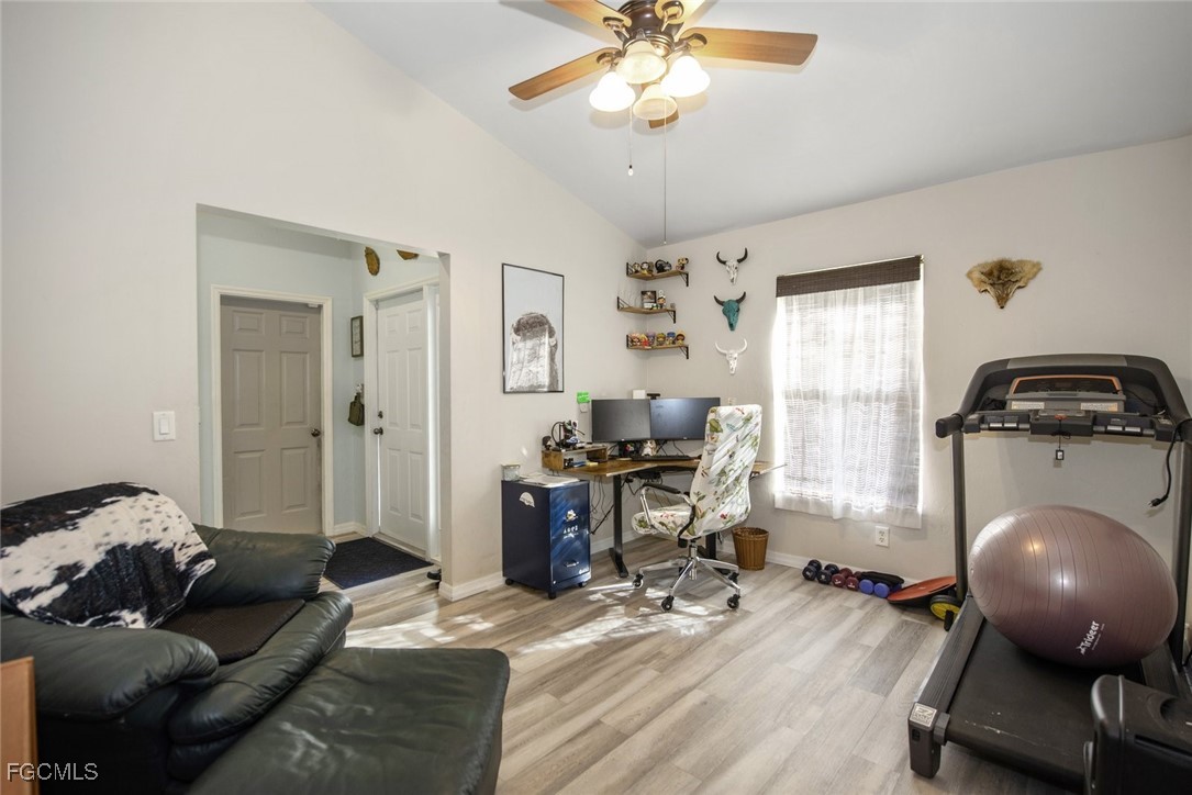 2005 Mc Arthur Avenue Alva, FL 33920 - Photo 26 of 32 a room with furniture and wooden floor