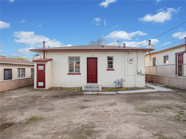 a big room with table and chairs