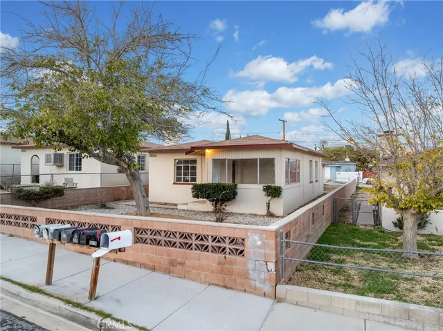 a front view of a house with garage