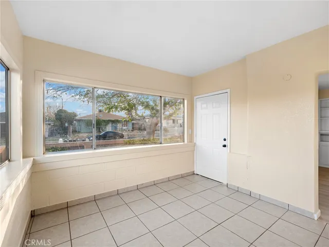 a large white room with a large window