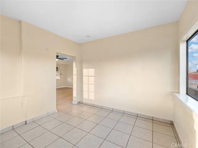 a view of an empty room and window