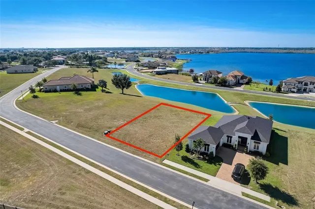 a view of a swimming pool with an ocean view
