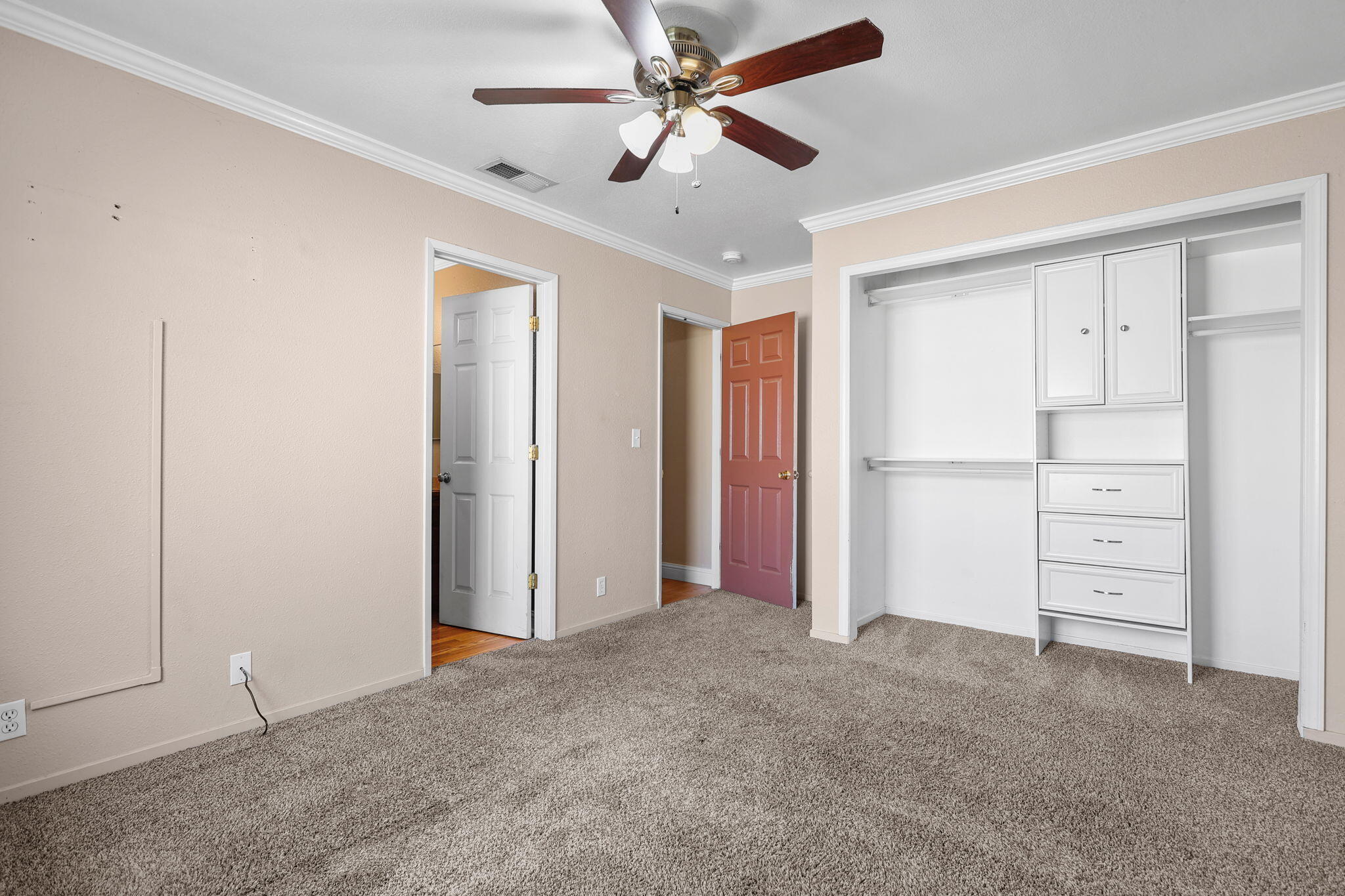 2180 Gentry Way Red Bluff, CA 96080 - Photo 16 of 27 a view of an empty room with a ceiling fan