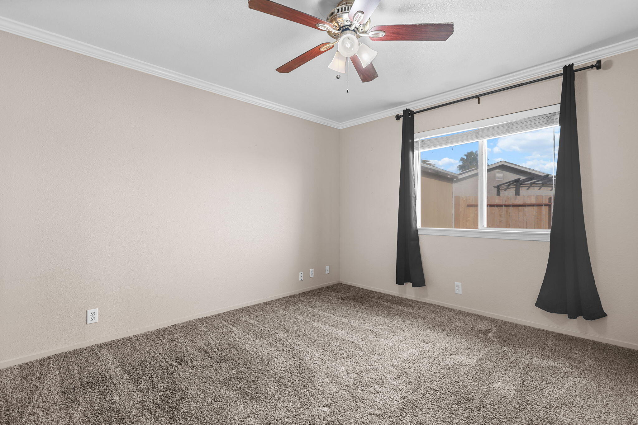 2180 Gentry Way Red Bluff, CA 96080 - Photo 17 of 27 a view of an empty room with a window