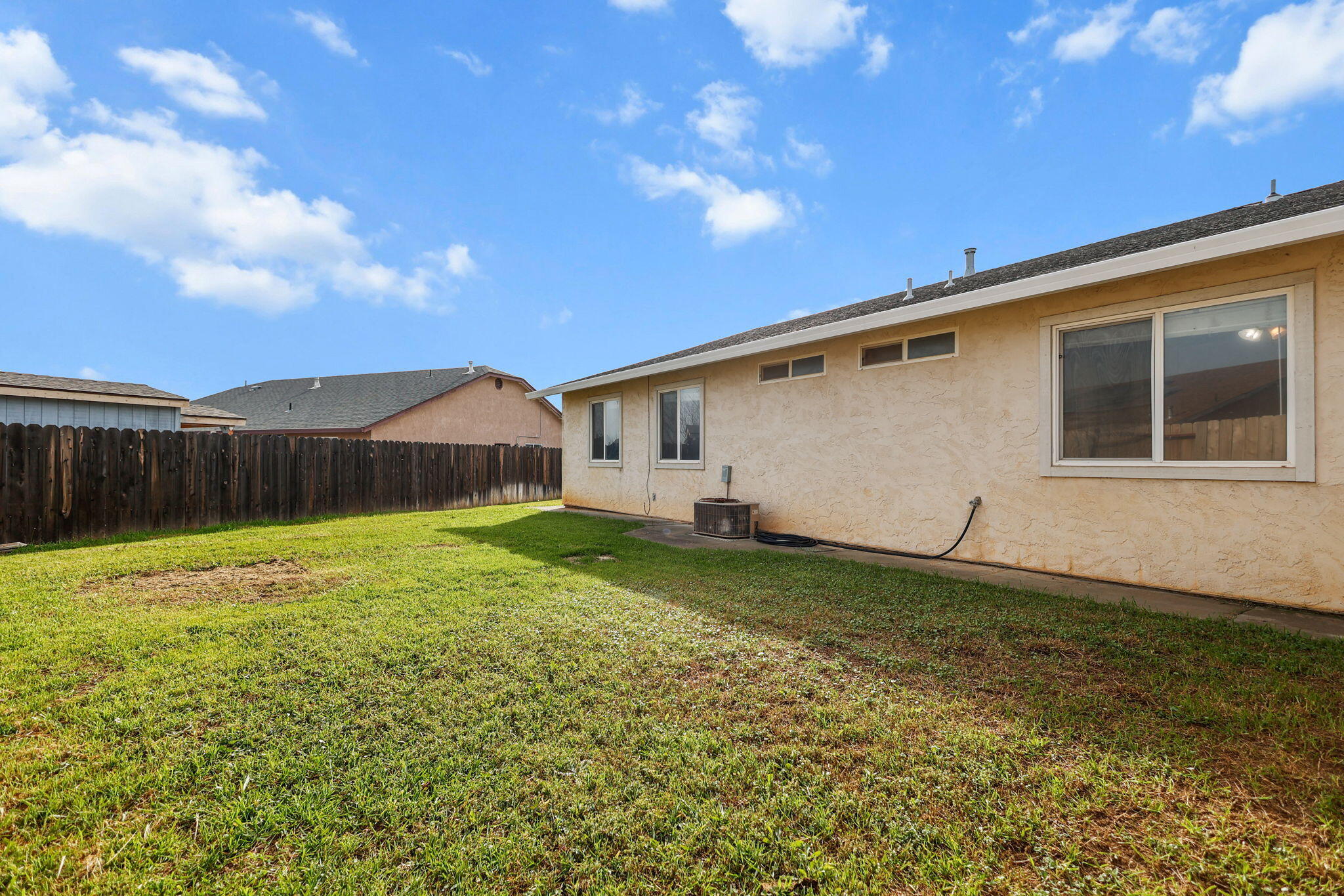 2180 Gentry Way Red Bluff, CA 96080 - Photo 21 of 27 a backyard view with a garden