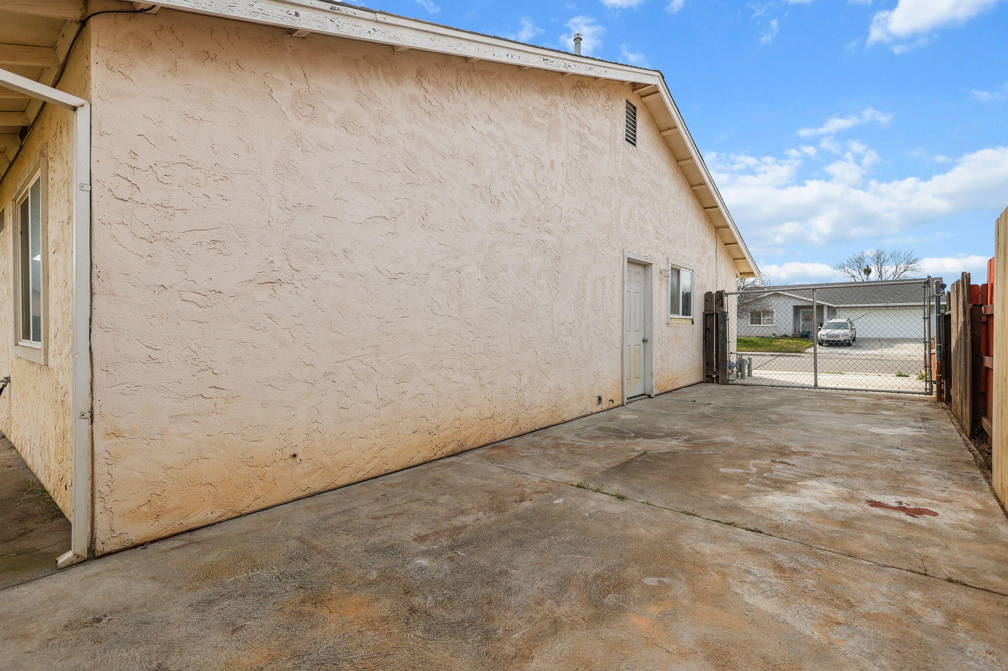2180 Gentry Way Red Bluff, CA 96080 - Photo 24 of 27 a view of a house with a backyard
