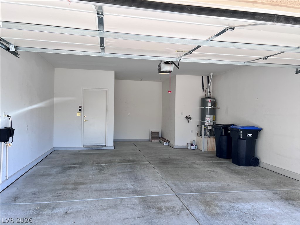 3047 Hickory Valley Road Henderson, NV 89052 - Photo 32 of 33 A spacious and pristine garage, ready for your vehicles and storage needs.
