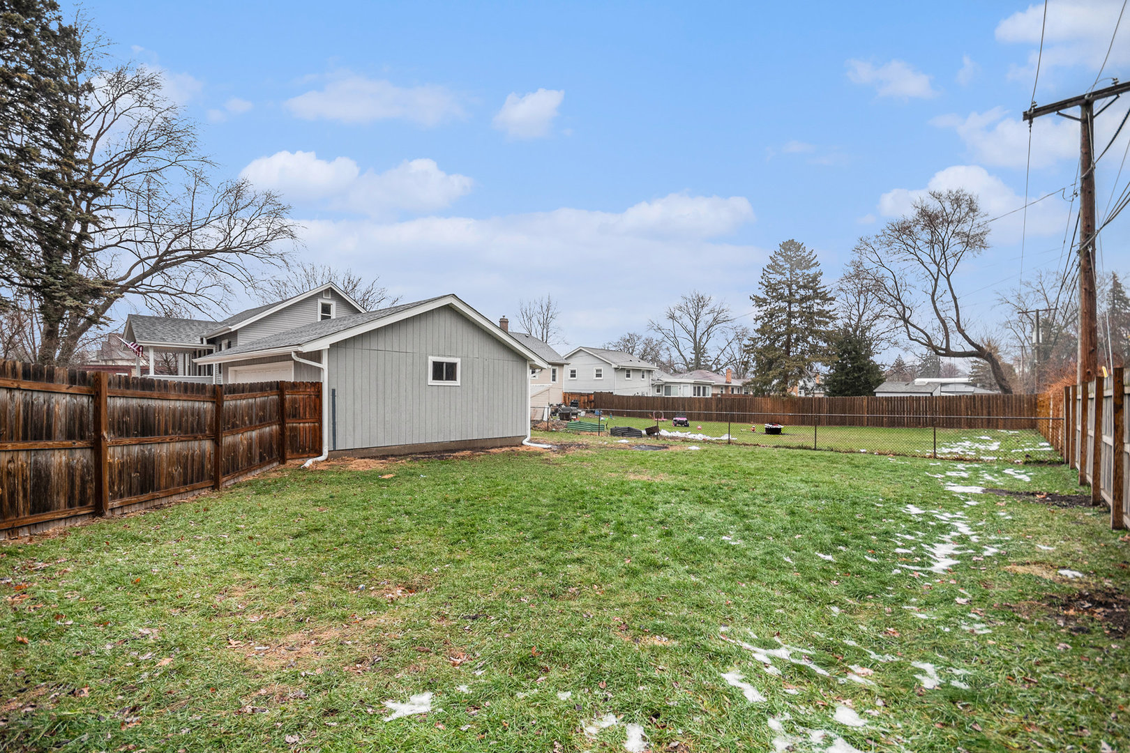 247 North West Road Lombard, IL 60148 - Photo 20 of 25 a house view with a garden space