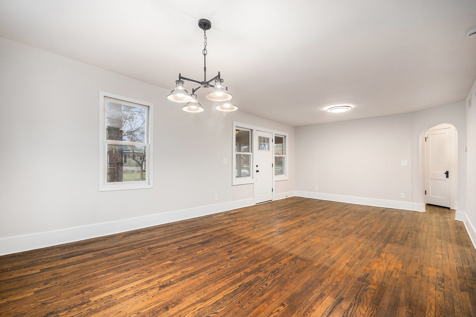 247 North West Road Lombard, IL 60148 - Photo 3 of 25 a view of empty room with wooden floor and fan
