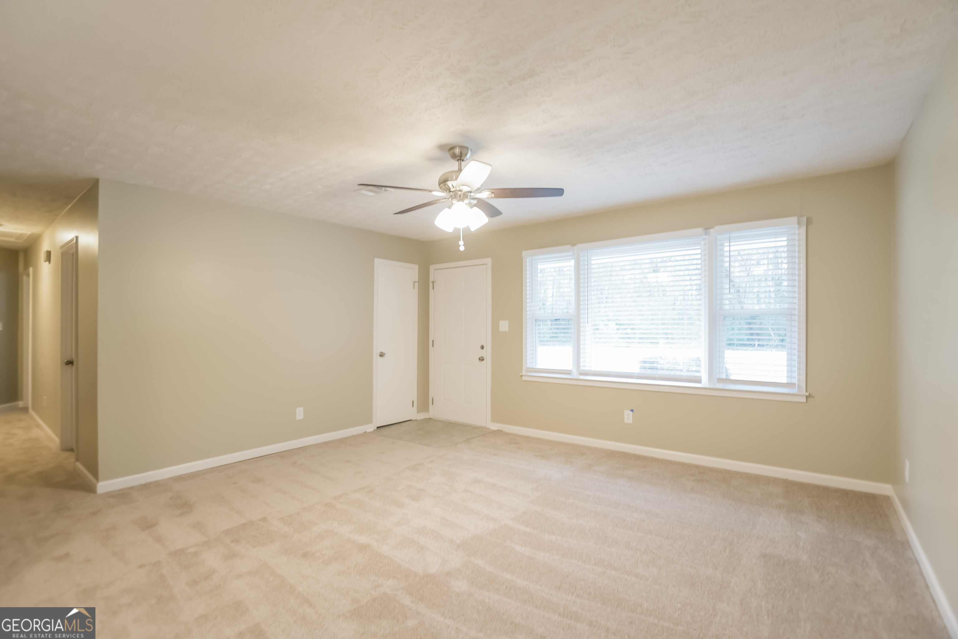 3250 Ridgecrest Drive Powder Springs, GA 30127 - Photo 4 of 15 a view of an empty room with a window