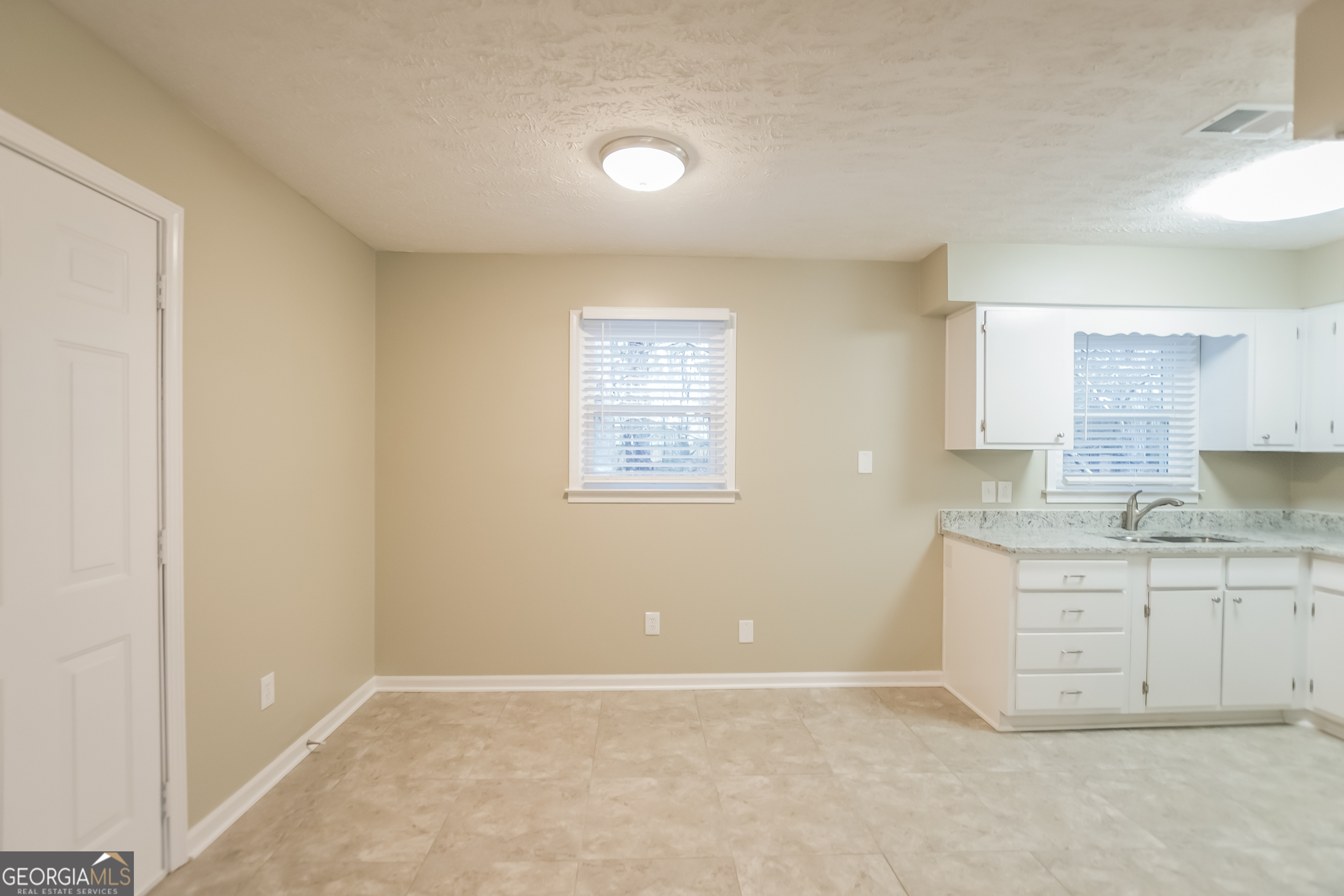 3250 Ridgecrest Drive Powder Springs, GA 30127 - Photo 5 of 15 a view of a kitchen with a sink