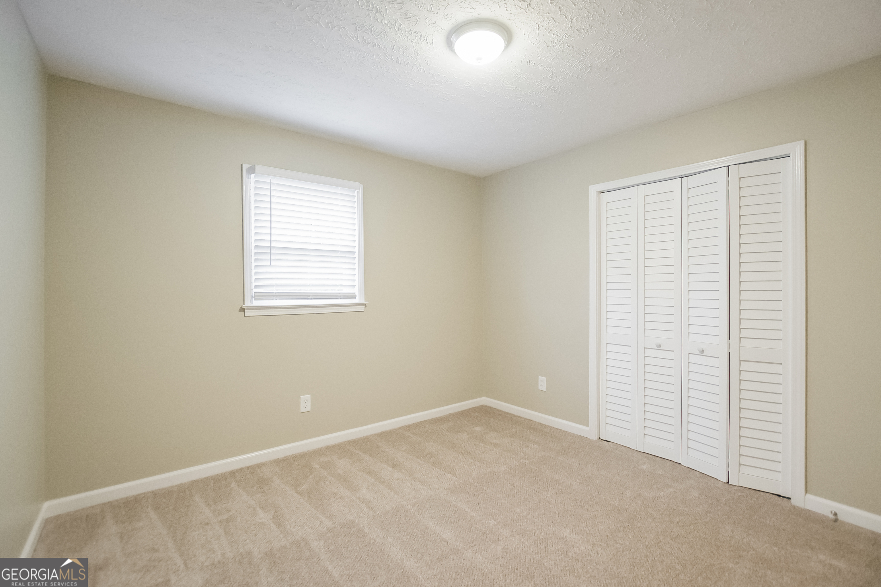 3250 Ridgecrest Drive Powder Springs, GA 30127 - Photo 8 of 15 an empty room with windows