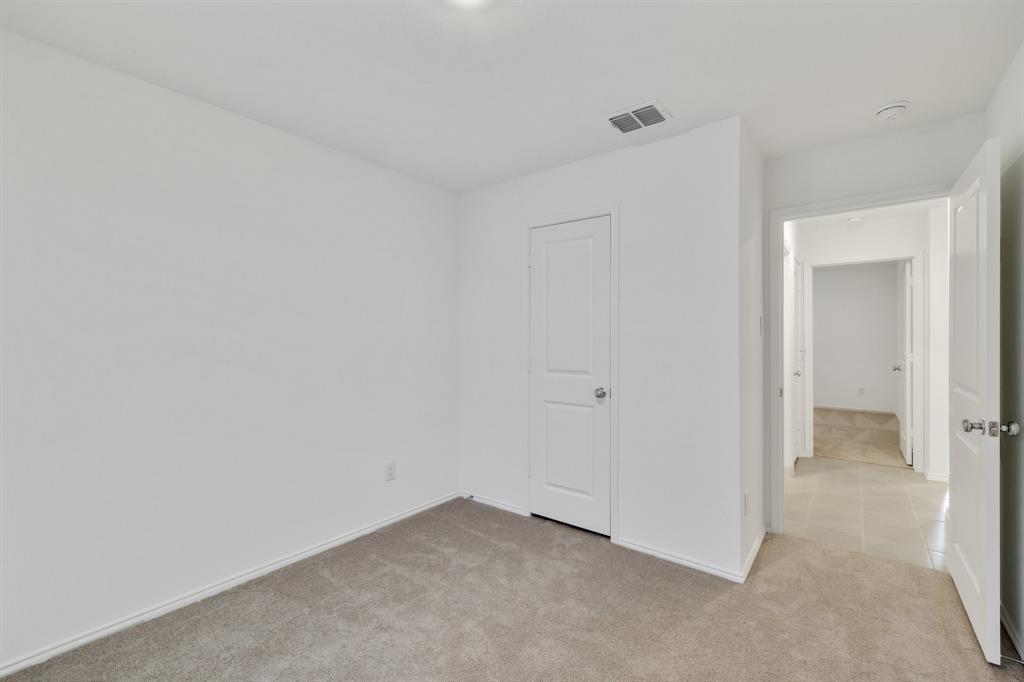 2809 Ozark Circle Little Elm, TX 75068 - Photo 12 of 28 a view of an empty room