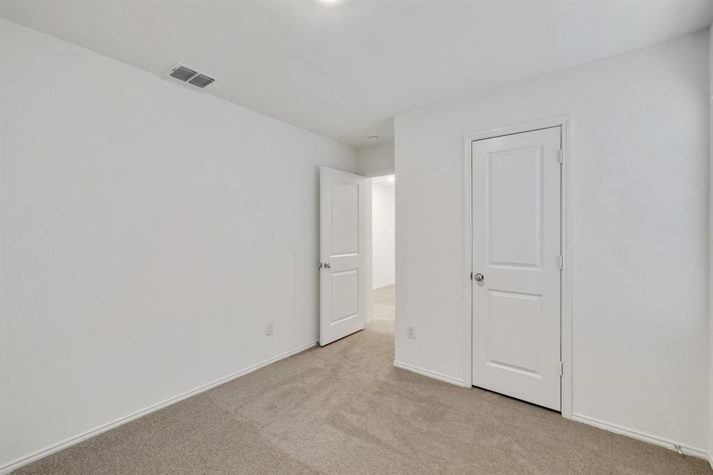 2809 Ozark Circle Little Elm, TX 75068 - Photo 15 of 28 a view of an empty room
