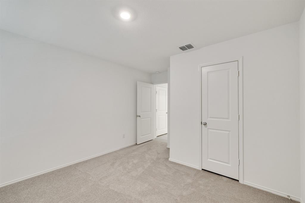 2809 Ozark Circle Little Elm, TX 75068 - Photo 17 of 28 a view of an empty room