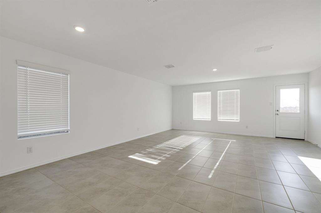 2809 Ozark Circle Little Elm, TX 75068 - Photo 19 of 28 a view of an empty room with a window