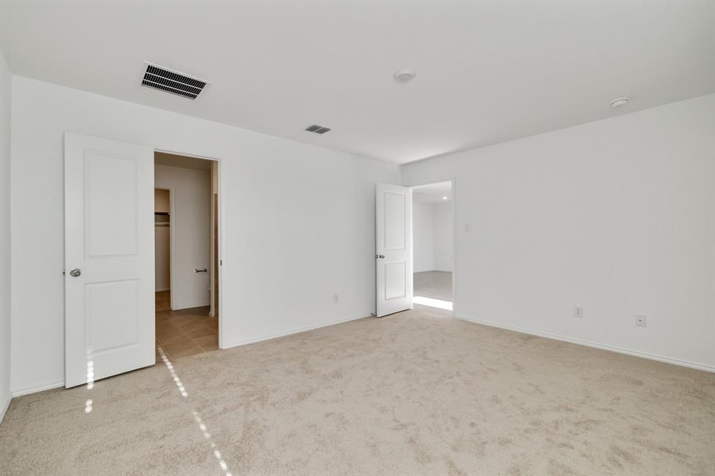 2809 Ozark Circle Little Elm, TX 75068 - Photo 21 of 28 a view of an empty room