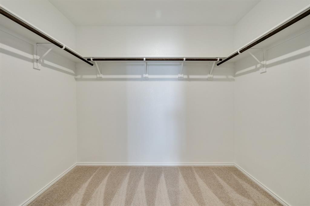 2809 Ozark Circle Little Elm, TX 75068 - Photo 25 of 28 a view of an empty walk in closet