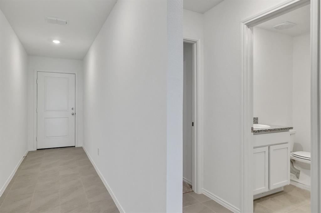 2809 Ozark Circle Little Elm, TX 75068 - Photo 10 of 28 a view of an empty room