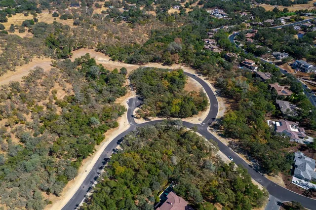 a view of a houses and green field
