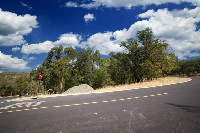 a view of a house with a street