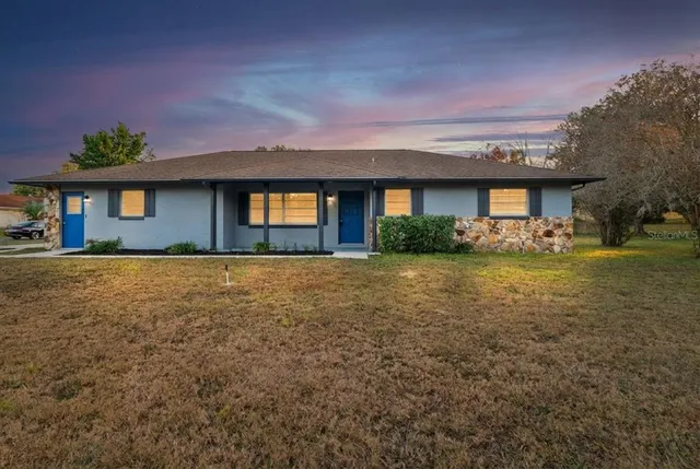 a front view of house with yard