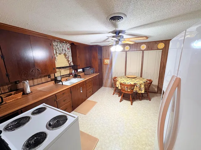 a bed room with a bed and a television