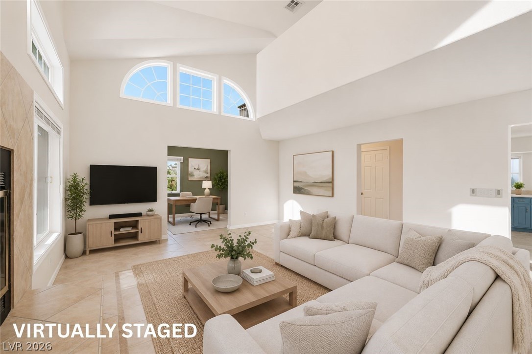 2570 East Kellogg Road Pahrump, NV 89048 - Photo 10 of 60 Virtually Staged large living room with wood-burning fireplace