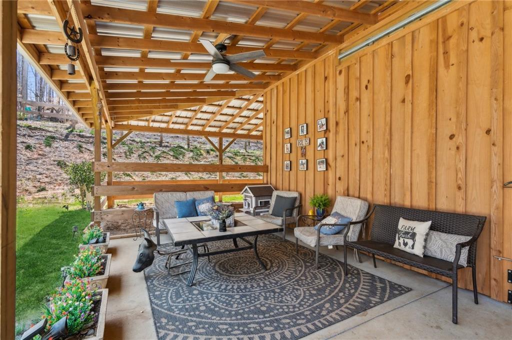 5388 Frazer Road Buford, GA 30518 - Photo 42 of 83 a living room with furniture and a large window