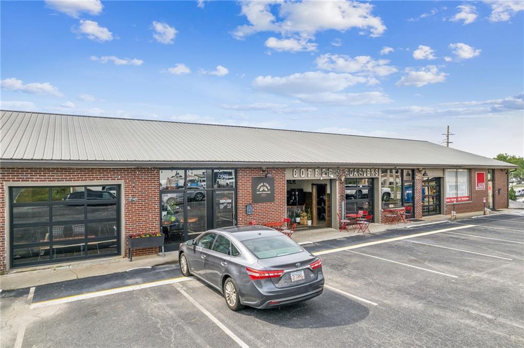 5388 Frazer Road Buford, GA 30518 - Photo 65 of 83 a car parked in front of building