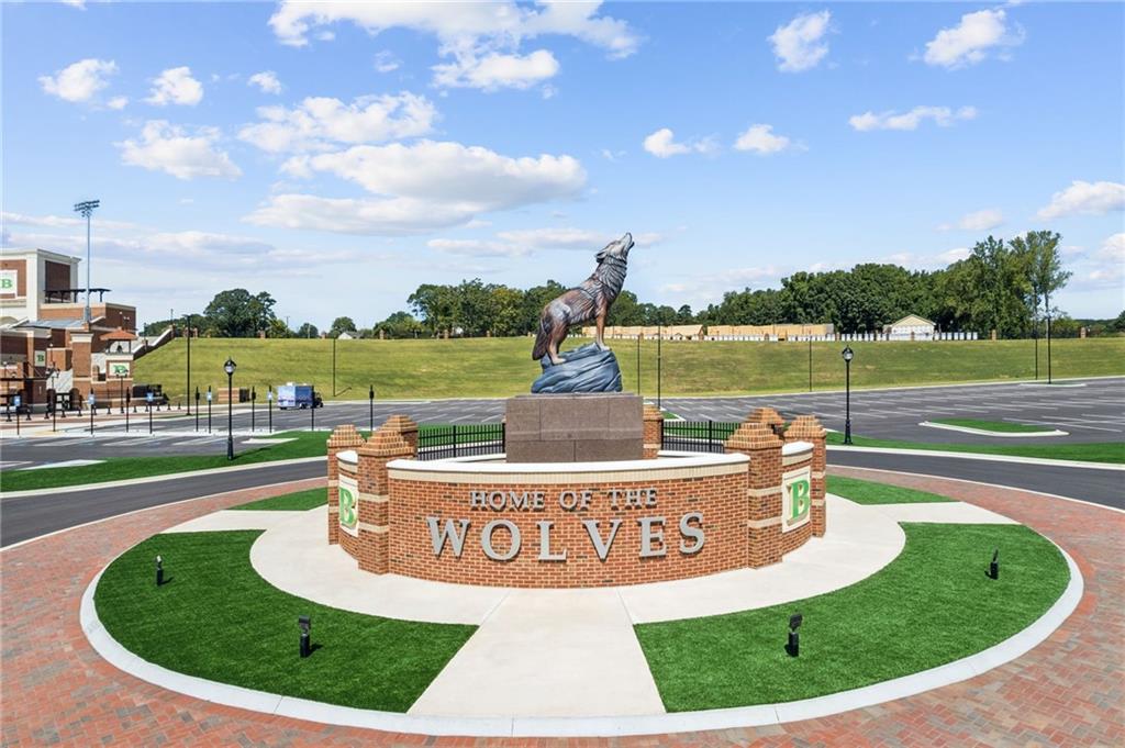 5388 Frazer Road Buford, GA 30518 - Photo 74 of 83 a view of a swimming pool with a yard